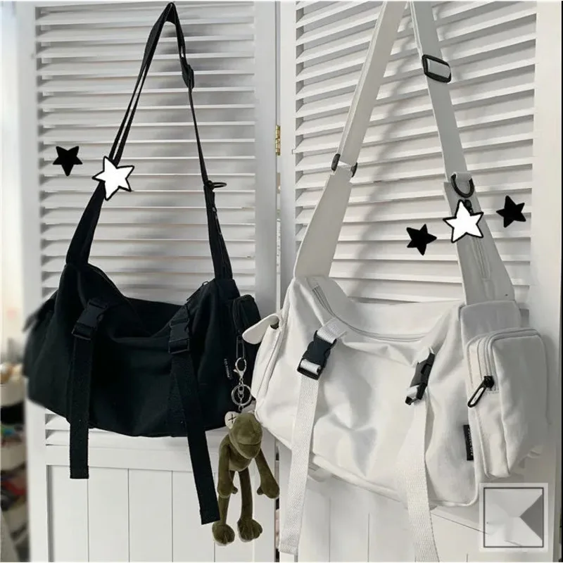 Korean retro workwear, Hong Kong style student canvas bag, men's unisex Japanese Harajuku women's crossbody bag
Korean retro workwear, Hong Kong style student canvas bag, men's unisex Japanese Harajuku women's crossbody bag