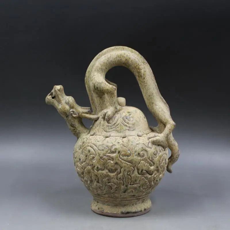 Yue kiln hand carved Qinglong reflux pot antique porcelain ornament collection decoration
Yue kiln hand carved Qinglong reflux pot antique porcelain ornament collection decoration 