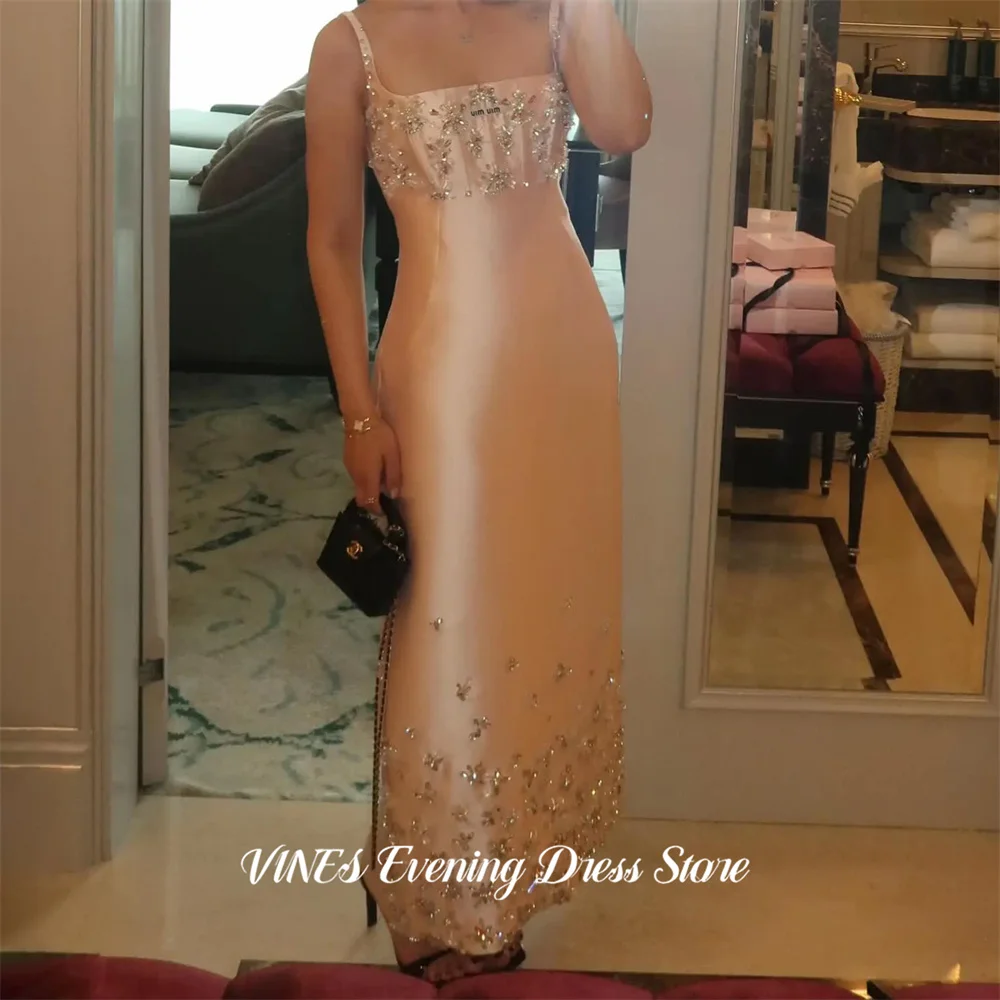 VINES Champagne Sheath Satin Prom Dresses Spaghetti Strap Luxury Formal Dresses with Beaded Evening Dresses for Women Customized
VINES Champagne Sheath Satin Prom Dresses Spaghetti Strap Luxury Formal Dresses with Beaded Evening Dresses for Women Customized