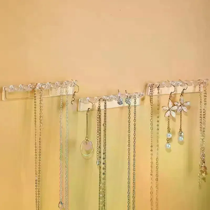 3 упаковки держателей для ожерелья, настенный органайзер для ожерелья с 8 крючками, для подвешивания ювелирных изделий, браслетов, браслетов и колец
3 упаковки держателей для ожерелья, настенный органайзер для ожерелья с 8 крючками, для подвешивания ювелирных изделий, браслетов, браслетов и колец