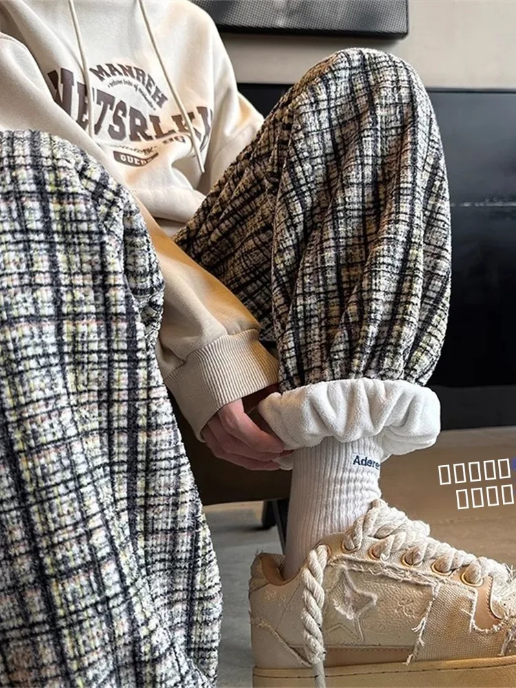 Мужские зимние спортивные брюки в клетку на флисовой подкладке, повседневные брюки, молодежные модные брендовые брюки с эластичным поясом, свободные длинные брюки
Мужские зимние спортивные брюки в клетку на флисовой подкладке, повседневные брюки, молодежные модные брендовые брюки с эластичным поясом, свободные длинные брюки