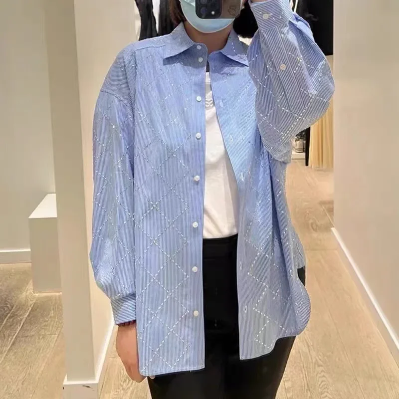 Women Lattice Hot Rhinestone Blue Blouse Summer 2024 New Turn Down Collar Ladies Single Breasted Long Sleeve Striped Shirt Tops
Women Lattice Hot Rhinestone Blue Blouse Summer 2024 New Turn Down Collar Ladies Single Breasted Long Sleeve Striped Shirt Tops