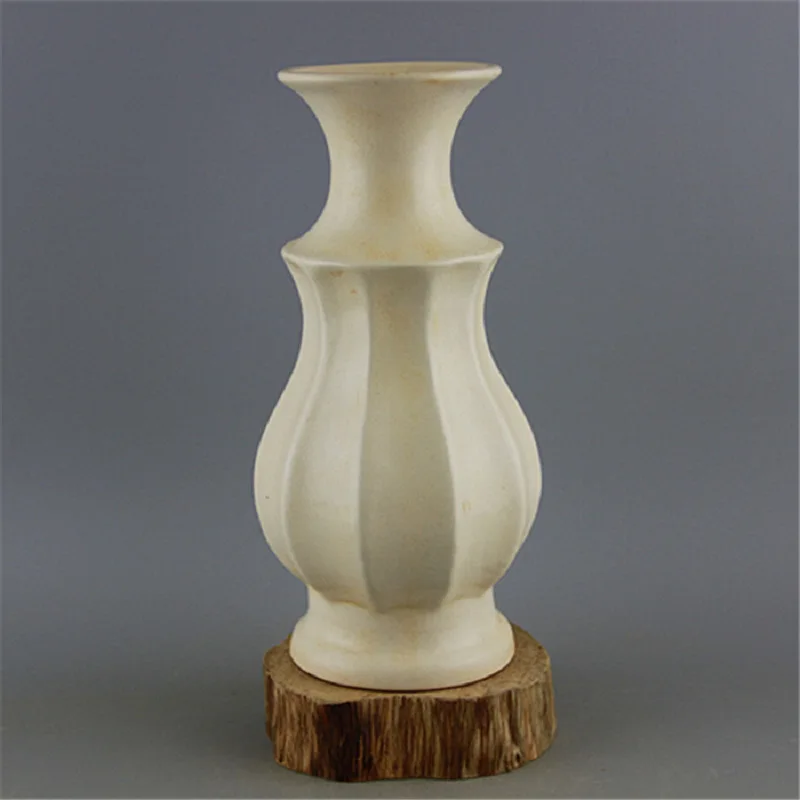 Chinese Song Ding Kiln White Glazed Multi Corner Vase Antique Porcelain Vintage Decoration Collection Ornament handicraft
Chinese Song Ding Kiln White Glazed Multi Corner Vase Antique Porcelain Vintage Decoration Collection Ornament handicraft