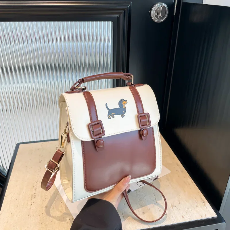 Contrasting color backpack shoulder small square bag trendy fashion versatile portable commuter bag
Contrasting color backpack shoulder small square bag trendy fashion versatile portable commuter bag