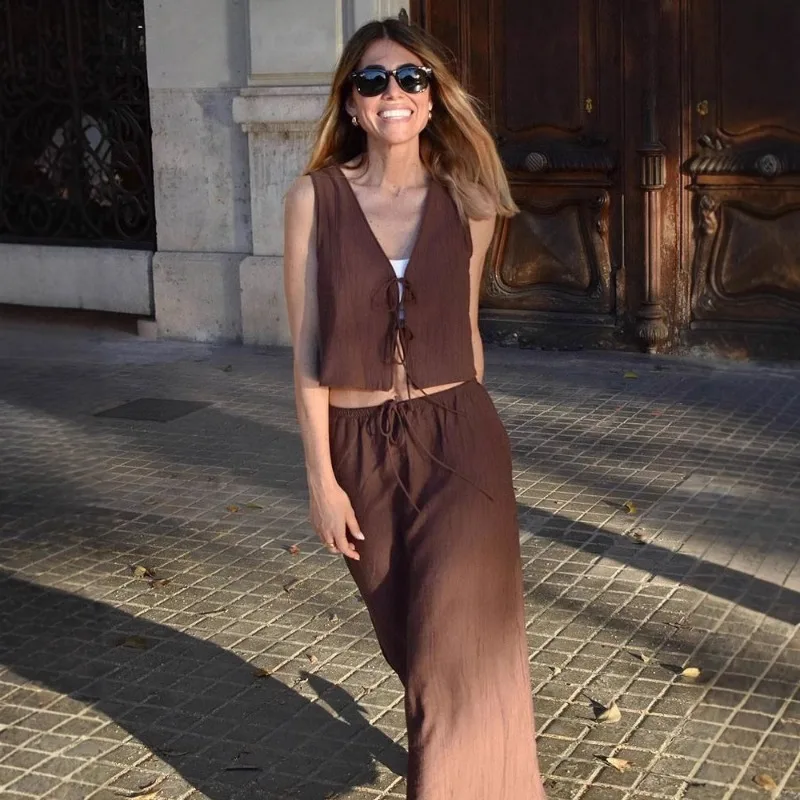 European and American Women's Summer New Style Textured Vest Style Top Solid Color Drawstring Long Skirt Two-piece Set
European and American Women's Summer New Style Textured Vest Style Top Solid Color Drawstring Long Skirt Two-piece Set