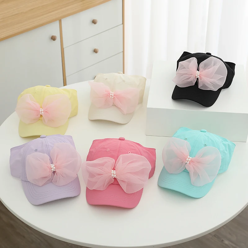 Kids Bow Empty Top Duckbill Hats Summer Girls Quick Dry Ponytail Cap Thin Breathable Baby Sunshade Visors 2-8Y Children Sun Hats 
Kids Bow Empty Top Duckbill Hats Summer Girls Quick Dry Ponytail Cap Thin Breathable Baby Sunshade Visors 2-8Y Children Sun Hats