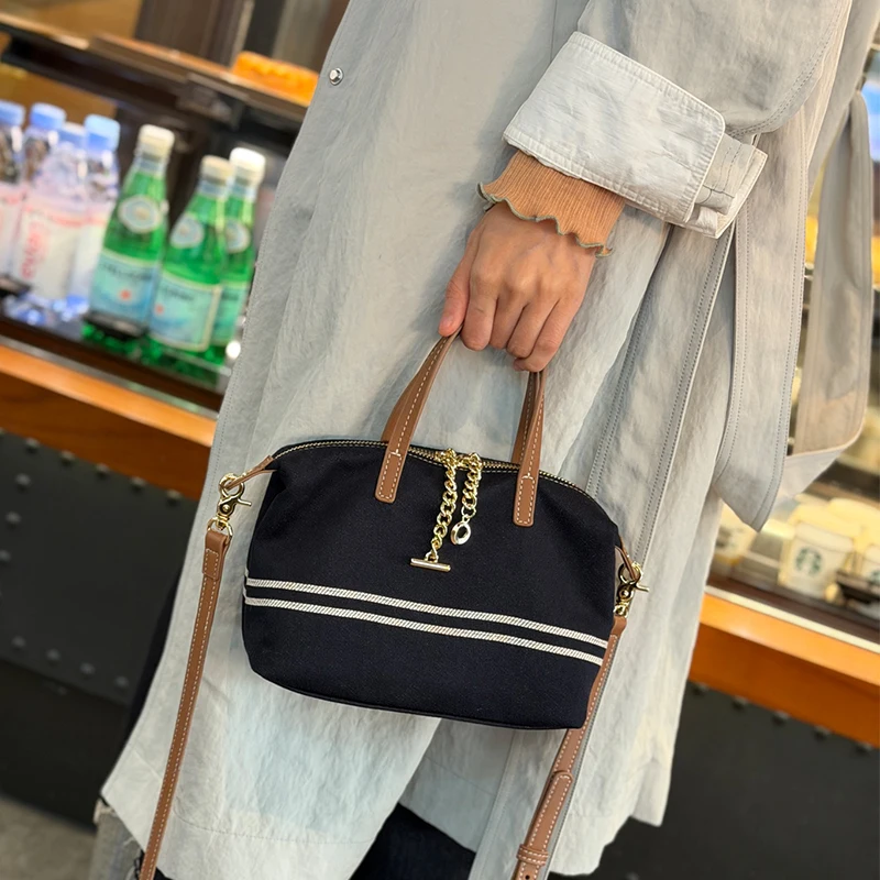 Denim & Genuine Cowhide Leather Mini Dome Bag for Women Luxury Designer Top Handle Crossbody Shoulder Bag with Gold Chain Detail
Denim & Genuine Cowhide Leather Mini Dome Bag for Women Luxury Designer Top Handle Crossbody Shoulder Bag with Gold Chain Detail