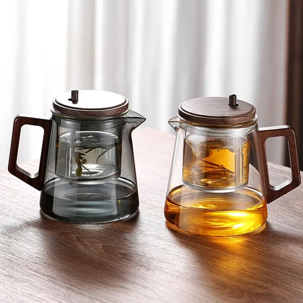 Creative Tea separation Glass Teapot Heat Resistant Large Capacity Lazy Kungfu Drip Teapot Press Control with Wooden Handle
Creative Tea separation Glass Teapot Heat Resistant Large Capacity Lazy Kungfu Drip Teapot Press Control with Wooden Handle