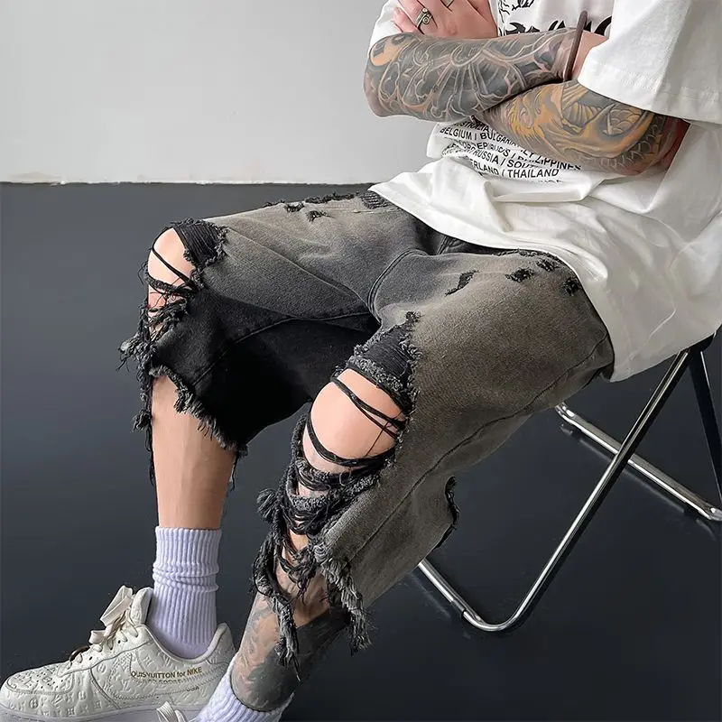 Men Trend American Vintage Streetwear Y2K Gothic Ripped Denim Shorts Summer Casual Pocket Loose Straight Knee Length Baggy Jeans
Men Trend American Vintage Streetwear Y2K Gothic Ripped Denim Shorts Summer Casual Pocket Loose Straight Knee Length Baggy Jeans