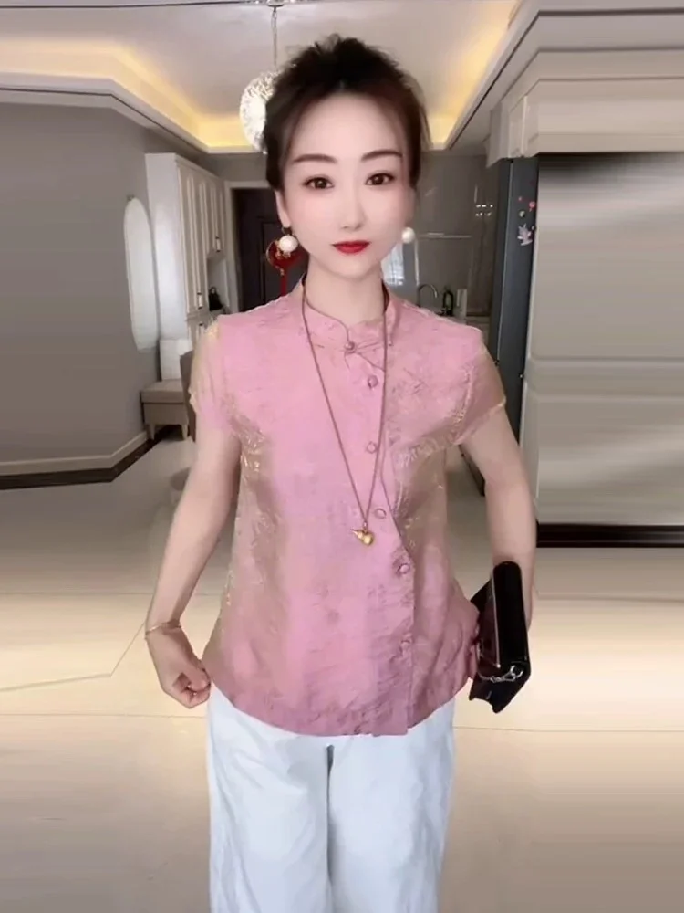 New Chinese Style Women's Short Sleeve Shirt Summer 2026 Elegant Retro Loose Stand Collar Side Button National Style Small Shirt
New Chinese Style Women's Short Sleeve Shirt Summer 2026 Elegant Retro Loose Stand Collar Side Button National Style Small Shirt