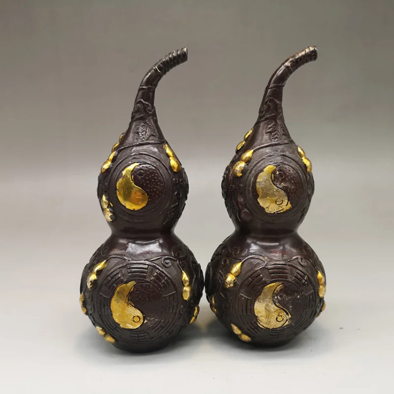 A pair of for decoration. Brass and copper gilded gourds with the Eight Trigrams symbol, home living room d
A pair of for decoration. Brass and copper gilded gourds with the Eight Trigrams symbol, home living room d