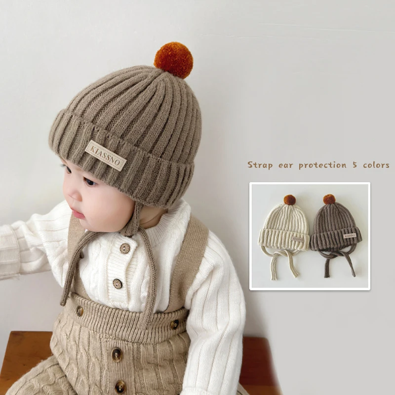 Baby Pompom Beanie Velvet Liner Kids Lace Up Sweater Bonnet Solid Color Woolen Pullover Cap 3-24M Infant Knit Ear Protection Hat
Baby Pompom Beanie Velvet Liner Kids Lace Up Sweater Bonnet Solid Color Woolen Pullover Cap 3-24M Infant Knit Ear Protection Hat