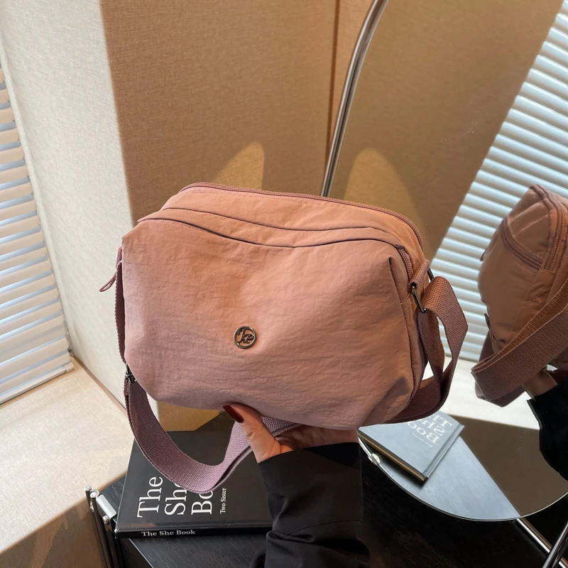 Trendy Korean Nylon Crossbody Bag for Women Zipper Pocket Casual Stylish Shoulder Bag Fashion Shell Bag Purse and Handbags Sac
Trendy Korean Nylon Crossbody Bag for Women Zipper Pocket Casual Stylish Shoulder Bag Fashion Shell Bag Purse and Handbags Sac