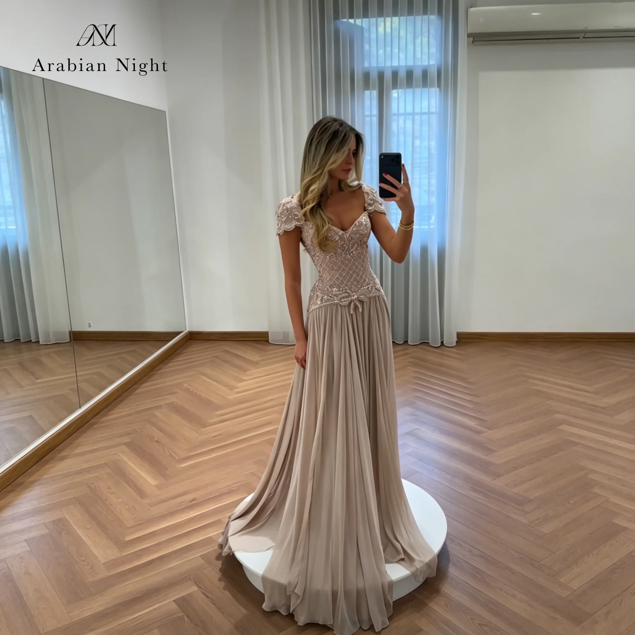 Elegant pale pink chiffon off-the-shoulder strapless floor-length formal ball gown featuring beaded embroidery
Elegant pale pink chiffon off-the-shoulder strapless floor-length formal ball gown featuring beaded embroidery