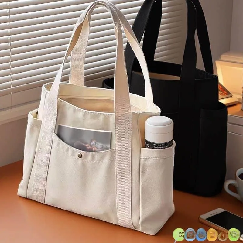 Large Capacity Canvas Tote Bag for Work Commuting Thickened Shoulder Bag Student Uniform Book Bag High Aesthetic Value
Large Capacity Canvas Tote Bag for Work Commuting Thickened Shoulder Bag Student Uniform Book Bag High Aesthetic Value
