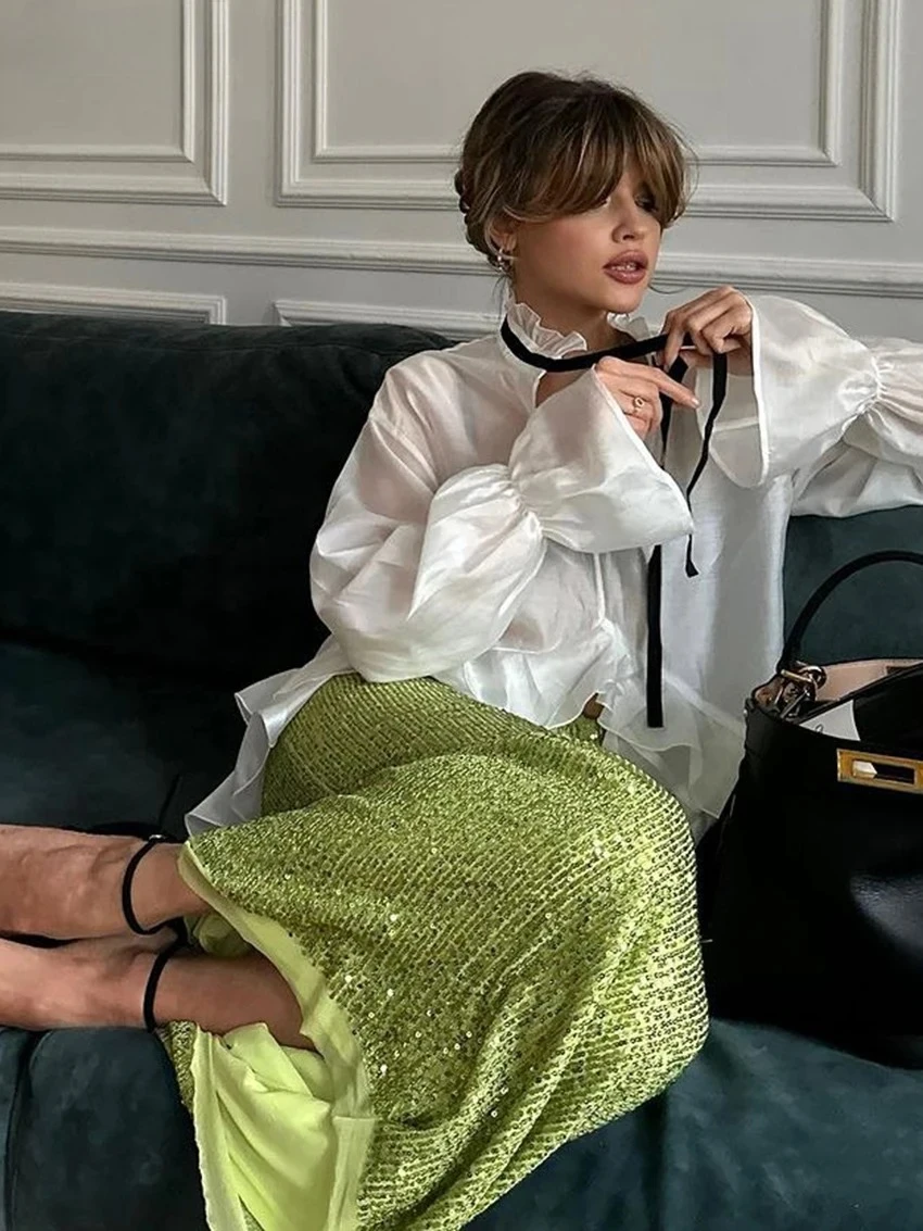 LIinar Sexy Loose White Women'S Shirt 2026 Fashion Ruffle Collar Long Sleeve Blouses Elegant See Through Top Female Clothing
LIinar Sexy Loose White Women'S Shirt 2026 Fashion Ruffle Collar Long Sleeve Blouses Elegant See Through Top Female Clothing