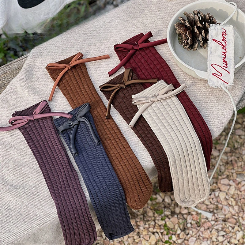 Kids socks mid-tube autumn and winter new children's Korean version solid-color bow cotton accessoire bebe
Kids socks mid-tube autumn and winter new children's Korean version solid-color bow cotton accessoire bebe