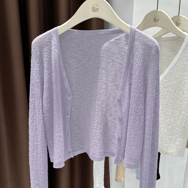 Ice silk knitted sun-proof cardigan for women in summer with suspender skirt and shawl, air-conditioning blouse and jacket
Ice silk knitted sun-proof cardigan for women in summer with suspender skirt and shawl, air-conditioning blouse and jacket