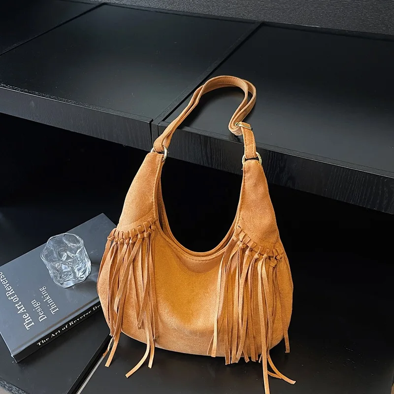 Fashionable Niche Crossbody Dumpling Bags New Versatile Large Capacity Work Commuting Tassel Women's Single Shoulder Bag
Fashionable Niche Crossbody Dumpling Bags New Versatile Large Capacity Work Commuting Tassel Women's Single Shoulder Bag