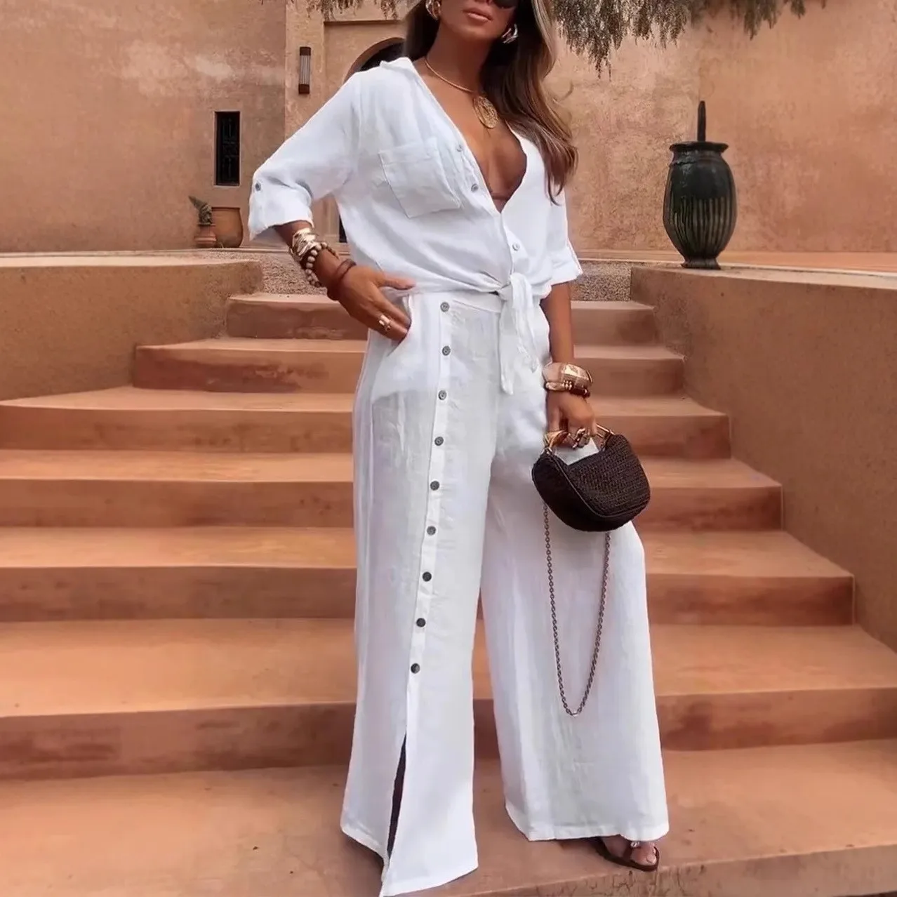 Spring Women's Clothing V Neck Long Sleeve Top And Wide Leg Button Pants Two Set Polyester Streetwear Suit
Spring Women's Clothing V Neck Long Sleeve Top And Wide Leg Button Pants Two Set Polyester Streetwear Suit