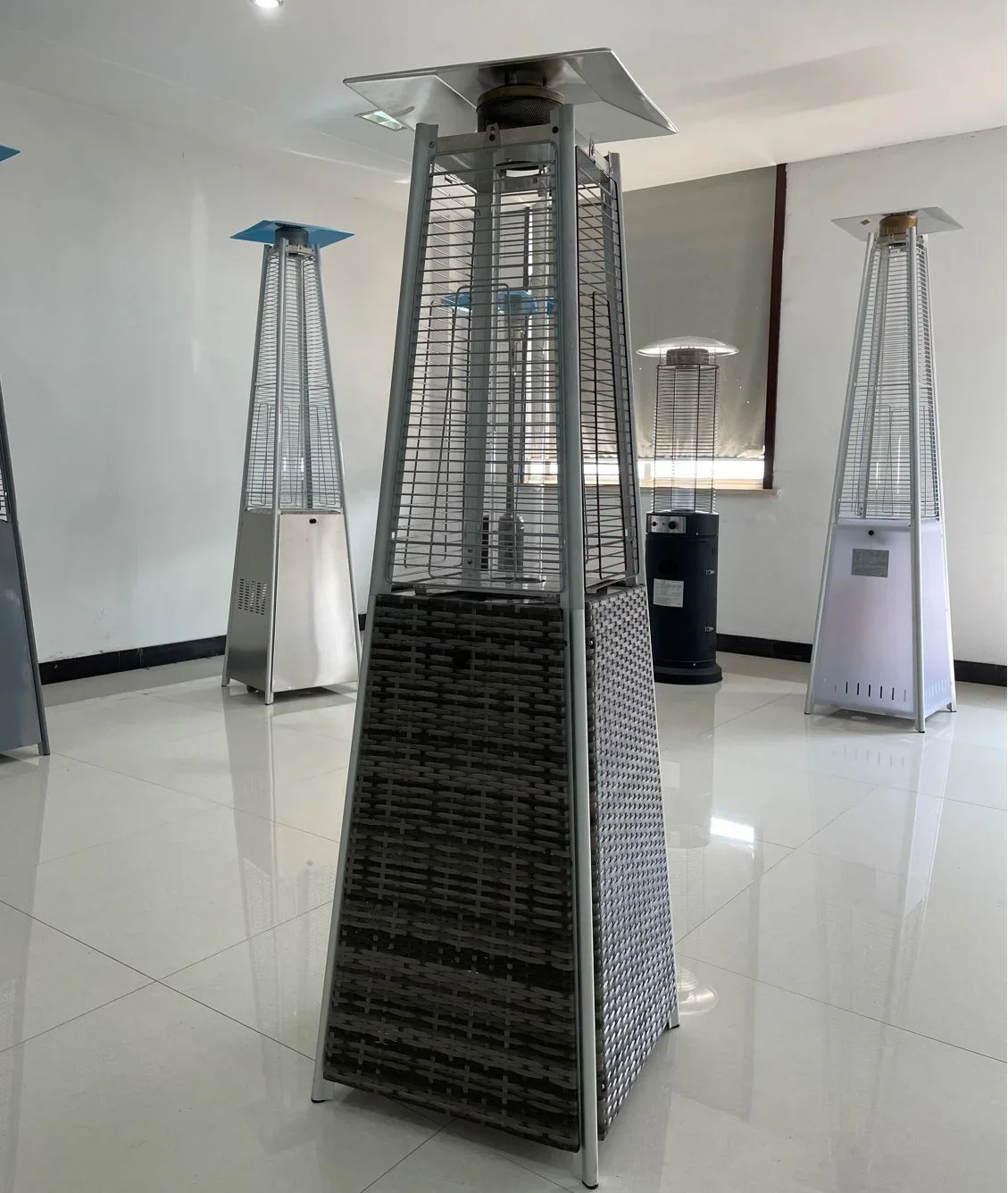 wicker rattan body Quartz glass tube patio heater, pyramid outdoor gas heater in powder coated steel
wicker rattan body Quartz glass tube patio heater, pyramid outdoor gas heater in powder coated steel