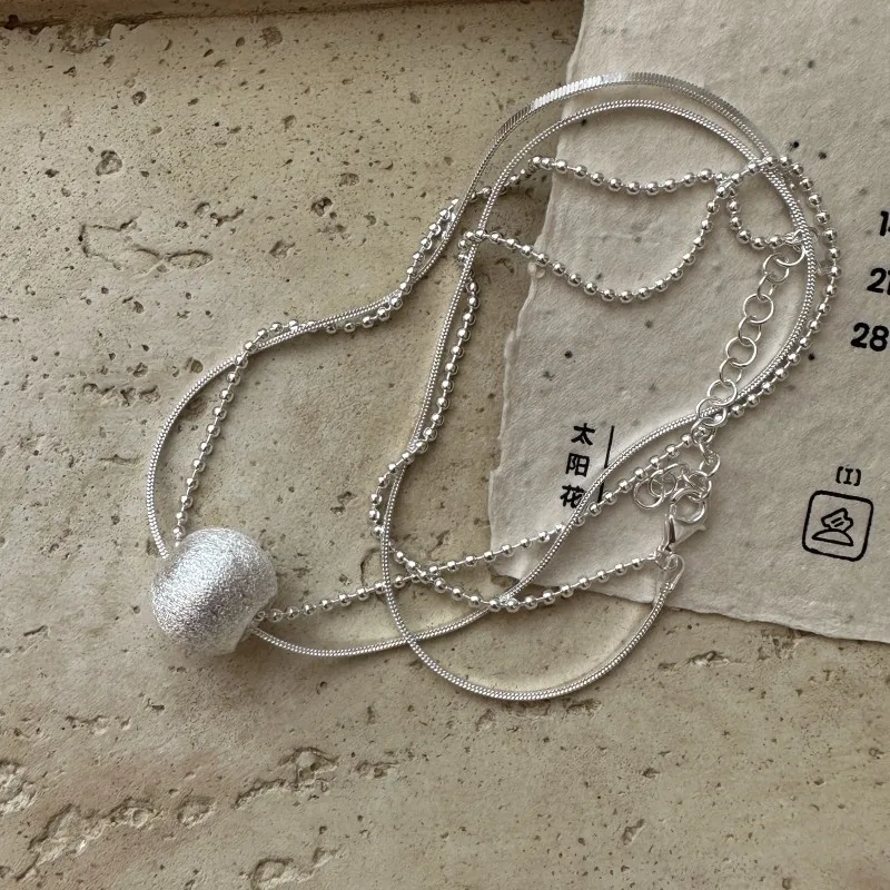 S925 Sterling Silver Niche Brushed Ball Double-layer Blade Necklace Fashionable Autumn Winter INS Collarbone Chain Wholesale
S925 Sterling Silver Niche Brushed Ball Double-layer Blade Necklace Fashionable Autumn Winter INS Collarbone Chain Wholesale