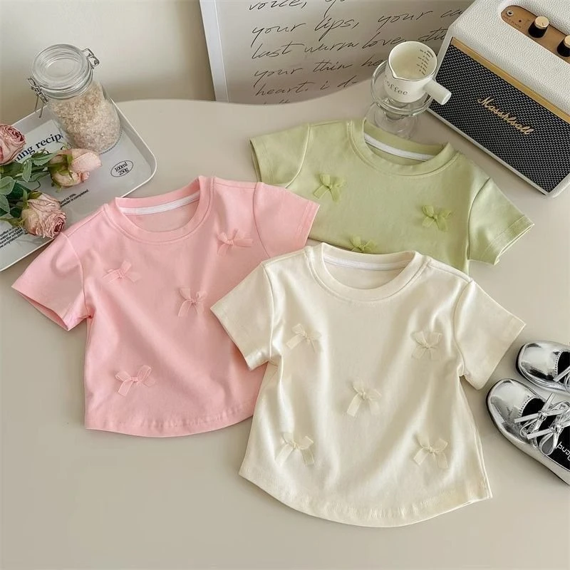 1-8 Years Old Girl's Short Sleeve 2025 Summer Korean New Sweet Cute Bow Baby Top Candy Color Children's T-shirt Girl Clothes
1-8 Years Old Girl's Short Sleeve 2025 Summer Korean New Sweet Cute Bow Baby Top Candy Color Children's T-shirt Girl Clothes