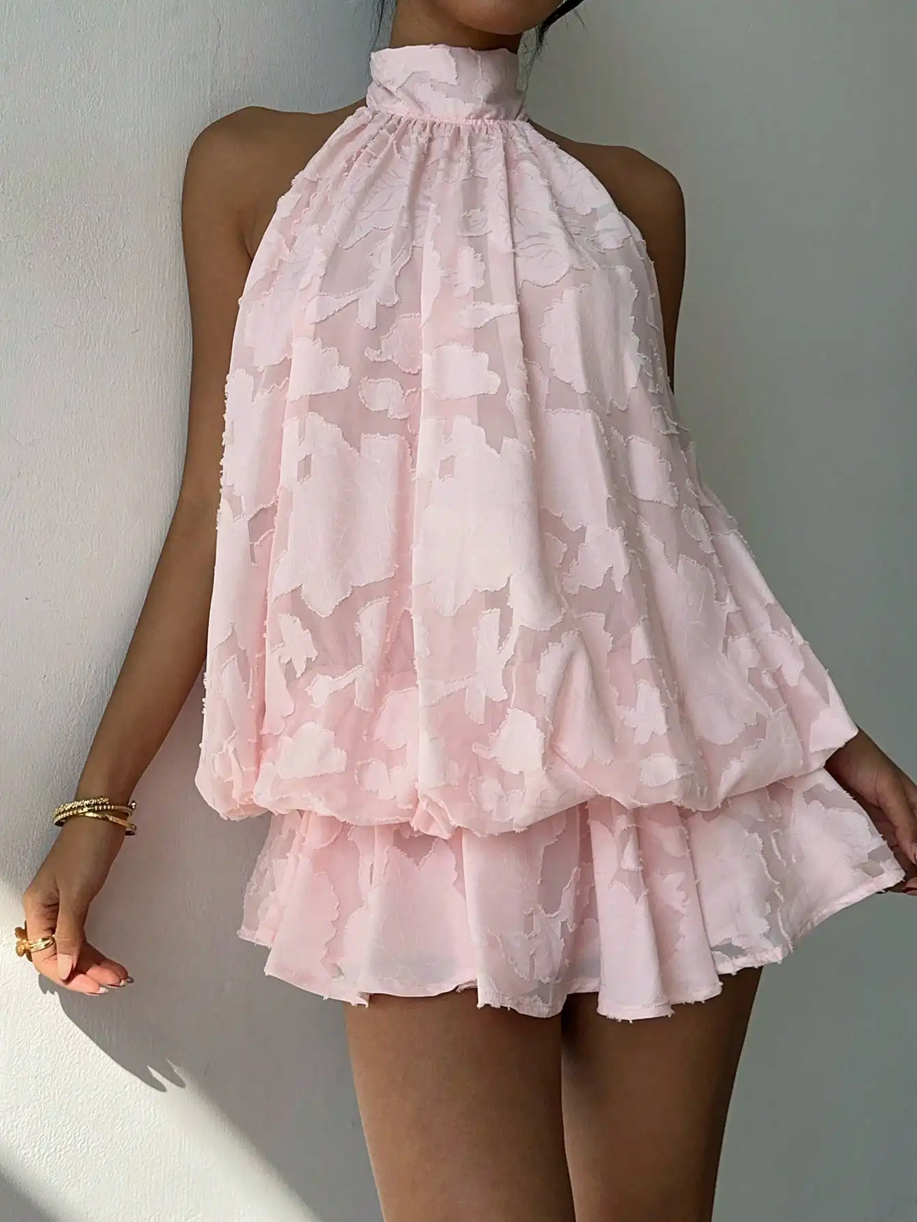 Soft Pink Floral Sheer Halter Neck Tiered Mini Dress For Summer Parties And Casual Occasions
Soft Pink Floral Sheer Halter Neck Tiered Mini Dress For Summer Parties And Casual Occasions