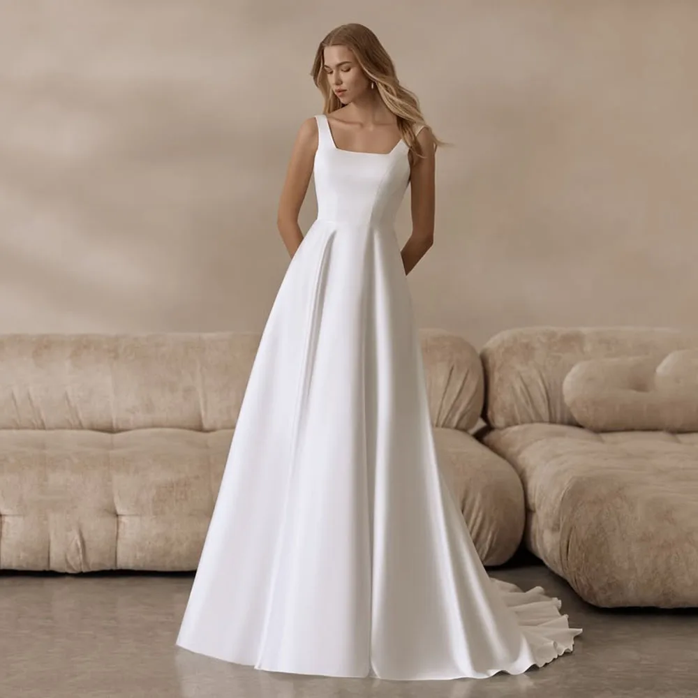 Customized Simple Wedding Dress 2025 Square Neck A Line Elegant White Bridal Gown Sleeveless Floor Length Brides Party Gown
Customized Simple Wedding Dress 2025 Square Neck A Line Elegant White Bridal Gown Sleeveless Floor Length Brides Party Gown
