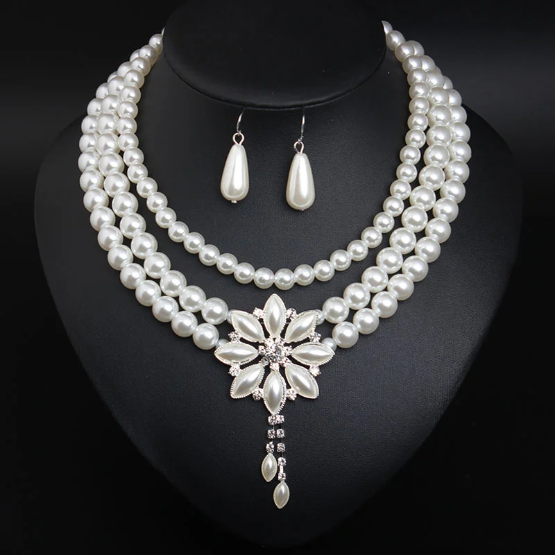 Multi-layered pearl flower necklace and earrings set - fashionable accessories for women
Multi-layered pearl flower necklace and earrings set - fashionable accessories for women