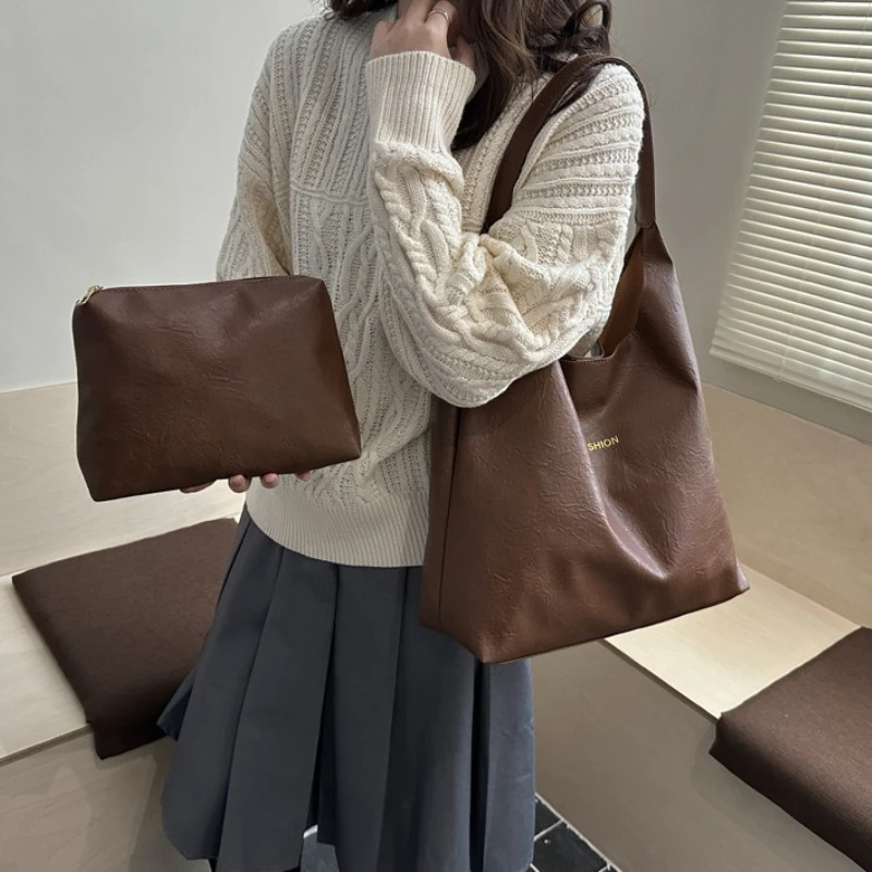Large Capacity Retro Tote Bag for Women Simple and Fashionable Single Shoulder Commuting Bag with A Small Bag
Large Capacity Retro Tote Bag for Women Simple and Fashionable Single Shoulder Commuting Bag with A Small Bag