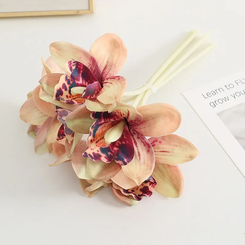 6 Head Cymbidium Artificial Bouquet Home Decor Wedding Bridal Bouquet Party Table Decorations and Accessories Mother's Day Gift
6 Head Cymbidium Artificial Bouquet Home Decor Wedding Bridal Bouquet Party Table Decorations and Accessories Mother's Day Gift