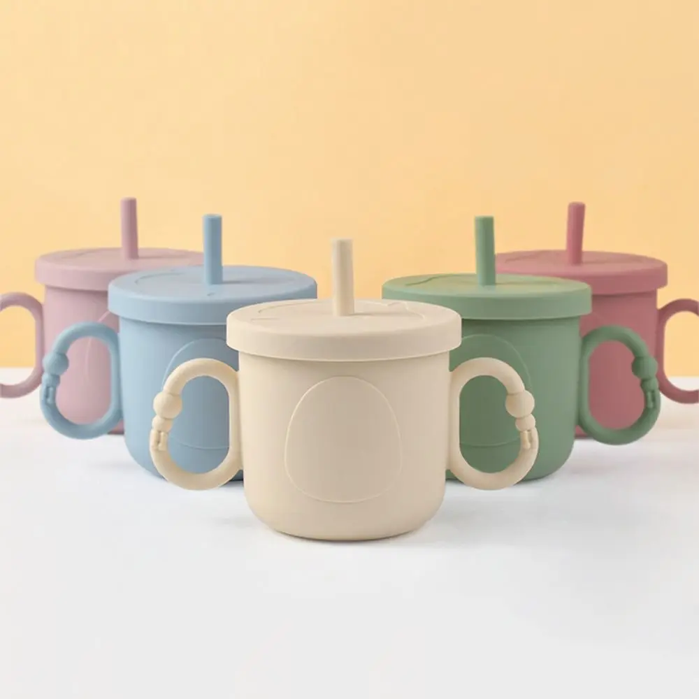 Food Grade Silicone Baby Training Cup Double Handle Portable Toddler Sippy Cups with Lid 200ml Toddlers Straw Water Bottle Kid
Food Grade Silicone Baby Training Cup Double Handle Portable Toddler Sippy Cups with Lid 200ml Toddlers Straw Water Bottle Kid