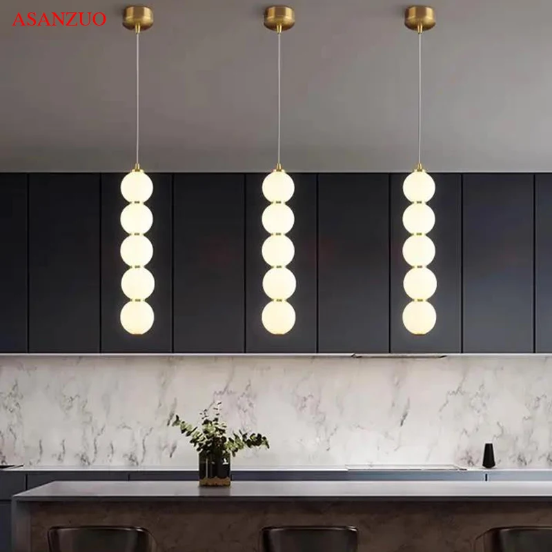 Nordic LED creative string glass ball pendant lights modern dining living room bedroom lamp ins net red Bar decor hanging light
Nordic LED creative string glass ball pendant lights modern dining living room bedroom lamp ins net red Bar decor hanging light