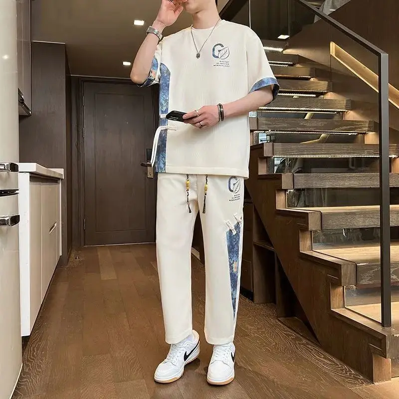 Summer New Casual Sportswear Set Men's Fashion Short Sleeve Handsome National Style Two-Piece Set Polyester Fiber Long Pants
Summer New Casual Sportswear Set Men's Fashion Short Sleeve Handsome National Style Two-Piece Set Polyester Fiber Long Pants