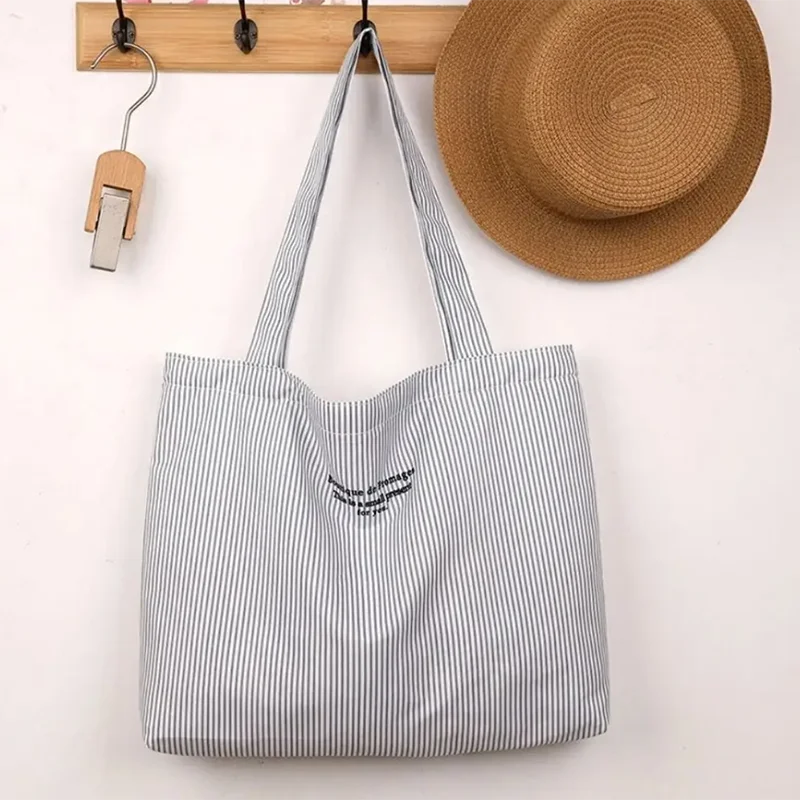 Simple Canvas Shoulder Bag Korean Style Large Capacity Tote Bag Striped Handbag for Women Girls
Simple Canvas Shoulder Bag Korean Style Large Capacity Tote Bag Striped Handbag for Women Girls