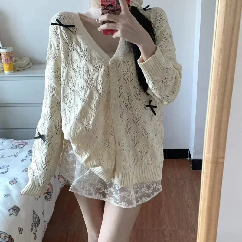 Hollow Out Bow Loose Knitted Solid Cardigan Tops Coats Women Long Sleeve V Neck Sweaters Japanese Sweet Preppy Style Y2k
Hollow Out Bow Loose Knitted Solid Cardigan Tops Coats Women Long Sleeve V Neck Sweaters Japanese Sweet Preppy Style Y2k
