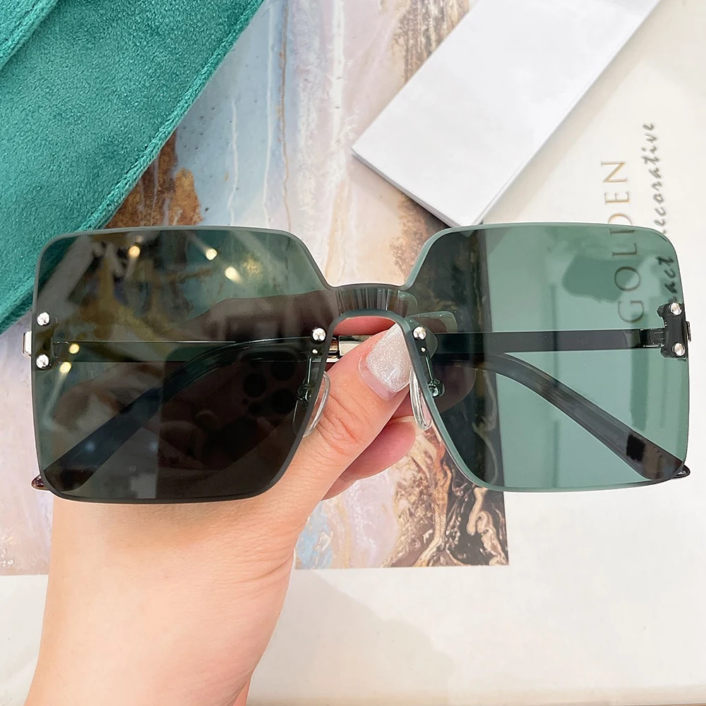 High Quality Square Rimless Lenses Alloy Glasses Frame Model 1623 Unisex Sunglasses High Street Fashion Eyewear Design
High Quality Square Rimless Lenses Alloy Glasses Frame Model 1623 Unisex Sunglasses High Street Fashion Eyewear Design