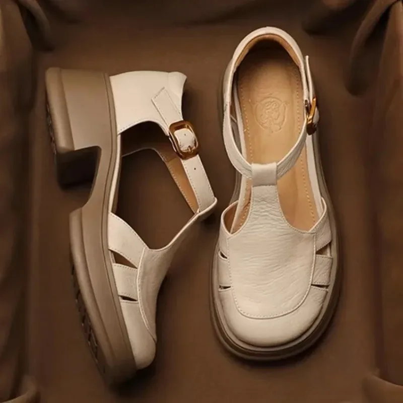 Women's Roman Style Thick Heel Sandals Soft Bottom Retro Hollow T-Strap Outdoor Summer Shoes Leather Material Foot Cover
Women's Roman Style Thick Heel Sandals Soft Bottom Retro Hollow T-Strap Outdoor Summer Shoes Leather Material Foot Cover