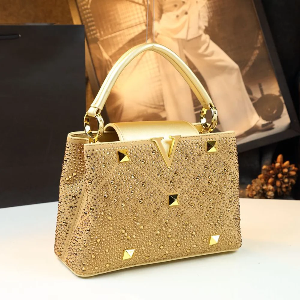Light luxury birthday gift bag for women 2025 new Kelly bag with high-end feel, rivet studded diamond commuter handbag
Light luxury birthday gift bag for women 2025 new Kelly bag with high-end feel, rivet studded diamond commuter handbag