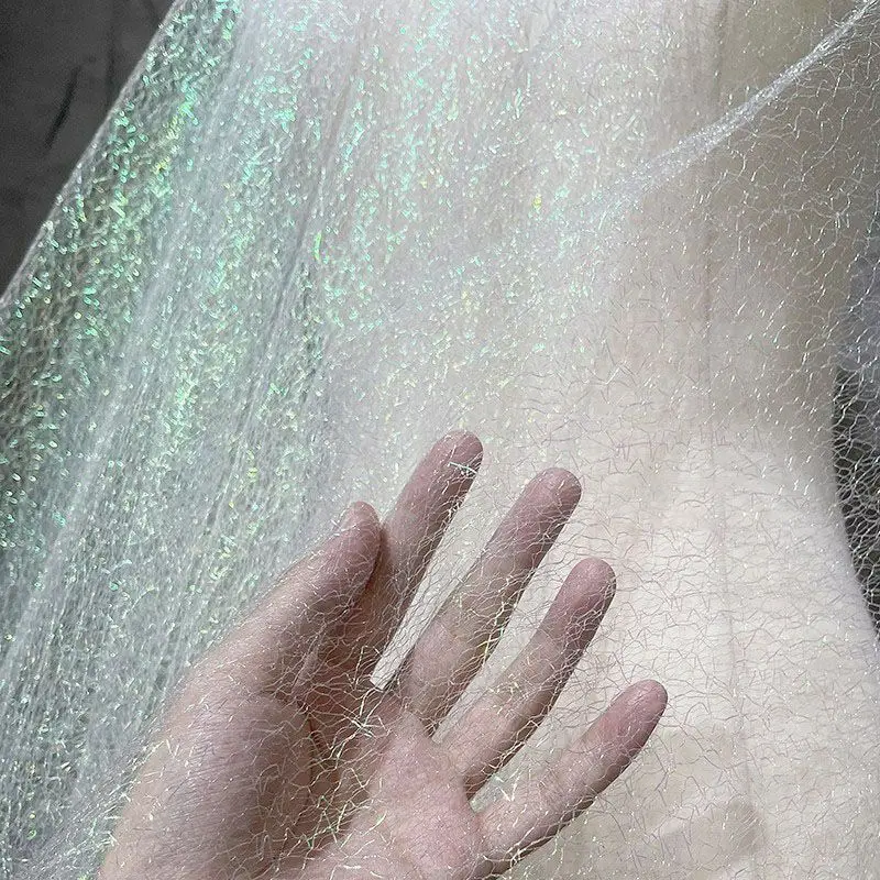 Синяя серебристая мягкая сетчатая ткань с вырезами, полупрозрачный фатин для украшения свадебных платьев, фонов, дизайнерских проектов и рукоделия.
Синяя серебристая мягкая сетчатая ткань с вырезами, полупрозрачный фатин для украшения свадебных платьев, фонов, дизайнерских проектов и рукоделия.