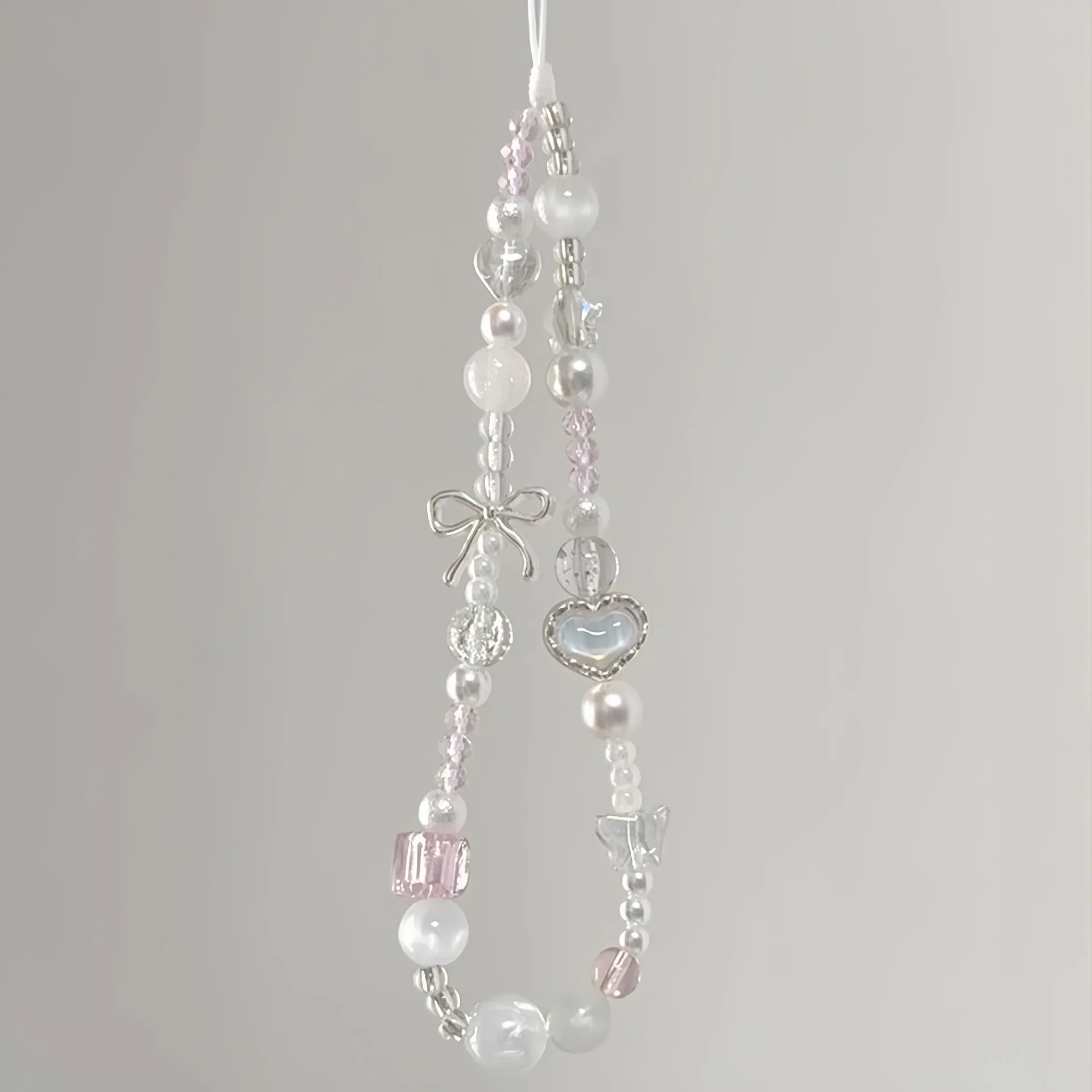 Y2K Cute White Bow Star Heart Pearl Beads Phone Chain For Girls iPhone Universal Accessories Lanyard Hanging Rope Bag Pendant
Y2K Cute White Bow Star Heart Pearl Beads Phone Chain For Girls iPhone Universal Accessories Lanyard Hanging Rope Bag Pendant