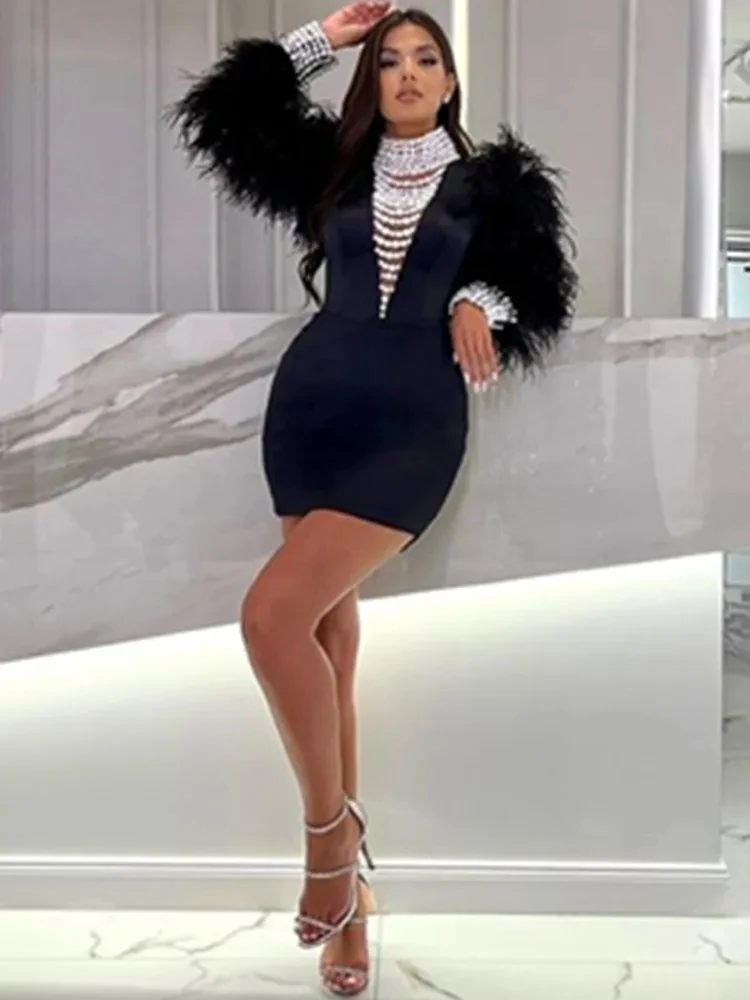 Women Celebrity Sexy Long Sleeve Pearl Black Feather Mini Dress Elegant Party Evening Stage Performance Outfit Vestido
Women Celebrity Sexy Long Sleeve Pearl Black Feather Mini Dress Elegant Party Evening Stage Performance Outfit Vestido