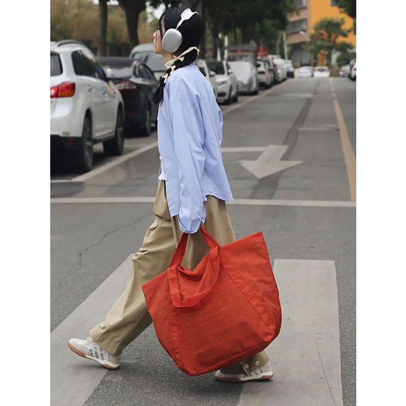 Large Capacity Commuting Waterproof Tote Bag Portable Fallow New Style Simple One Shoulder Nylon Schoolgirl Bag
Large Capacity Commuting Waterproof Tote Bag Portable Fallow New Style Simple One Shoulder Nylon Schoolgirl Bag