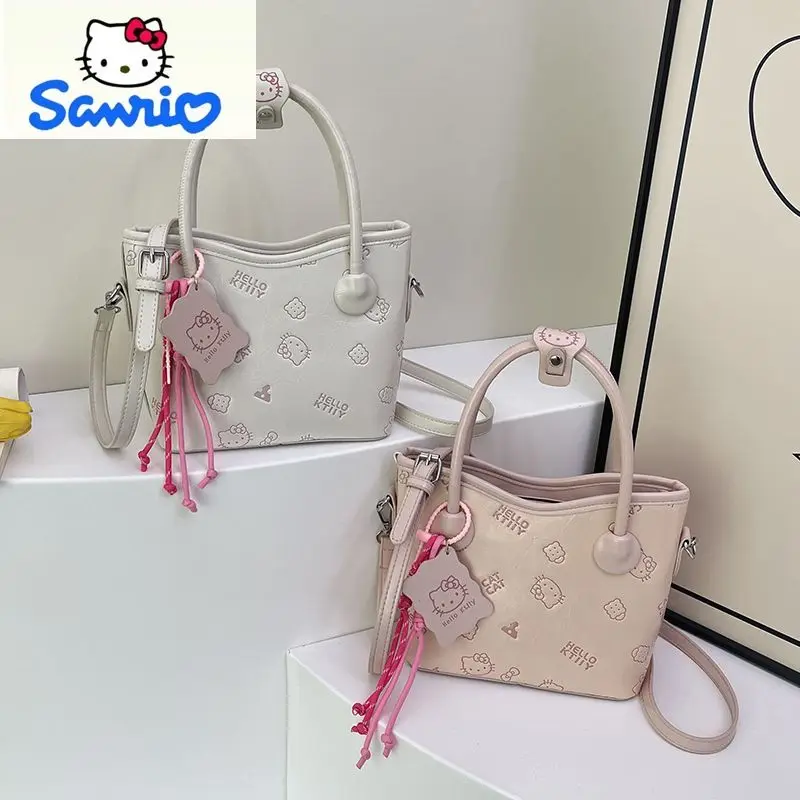 Sanrio модная высококачественная сумка из искусственной кожи, женская универсальная сумка-ведро с милым рисунком Hello Kitty для хранения
Sanrio модная высококачественная сумка из искусственной кожи, женская универсальная сумка-ведро с милым рисунком Hello Kitty для хранения
