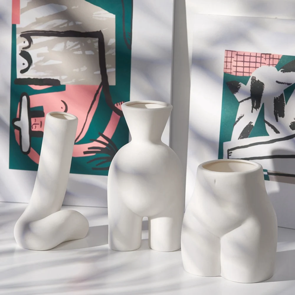 ins Nordic white ceramic creative simple dry flower vase home decoration living room porch flower arrangement device decoration
ins Nordic white ceramic creative simple dry flower vase home decoration living room porch flower arrangement device decoration