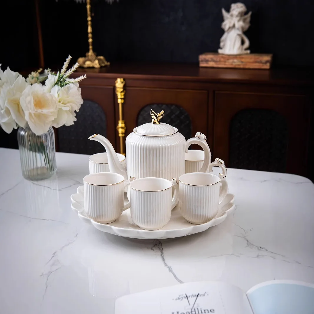 Striped ceramic household water set Living room vertical pattern teapot cold kettle kettle light cross-border e-commerce
Striped ceramic household water set Living room vertical pattern teapot cold kettle kettle light cross-border e-commerce
