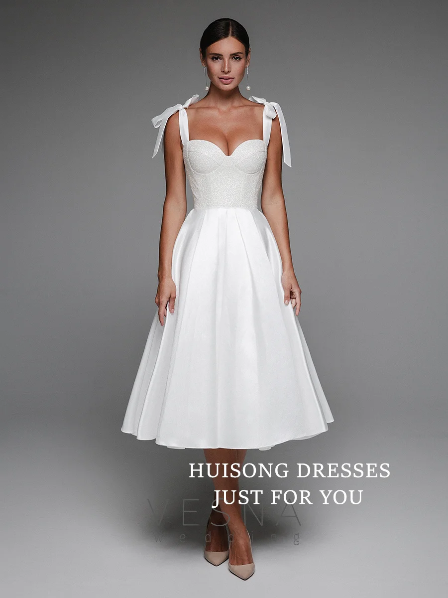 HUISONG Customized Glitter Satin Midi Wedding Dresses Sleeveless Spaghetti Straps A-Line Tea-Length Beach Bridal Gown 2025
HUISONG Customized Glitter Satin Midi Wedding Dresses Sleeveless Spaghetti Straps A-Line Tea-Length Beach Bridal Gown 2025