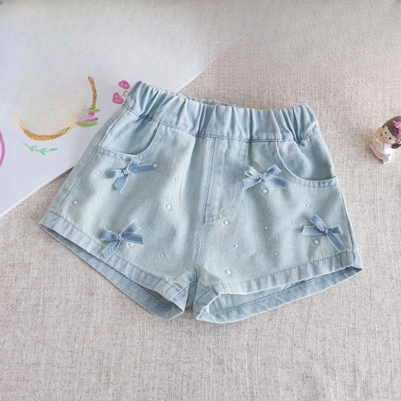 Джинсовые шорты для девочек 2026: Новая летняя коллекция, стильные универсальные шорты с бантом, повседневные штаны для малышей, коллекция одежды
Джинсовые шорты для девочек 2026: Новая летняя коллекция, стильные универсальные шорты с бантом, повседневные штаны для малышей, коллекция одежды