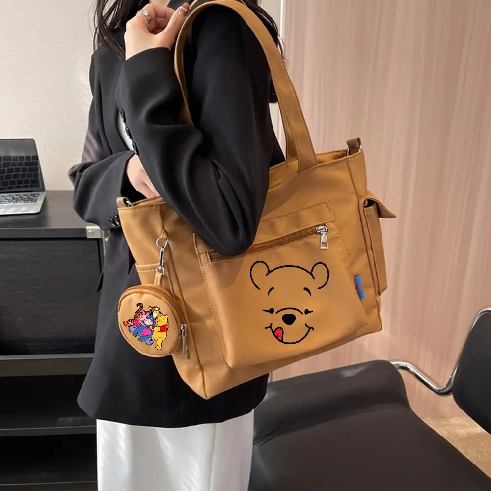Winnie the Pooh Oxford Canvas Composite Shoulder Bag Versatile Lazy Style Crossbody Bag Large Capacity Commuter Tote Bag
Winnie the Pooh Oxford Canvas Composite Shoulder Bag Versatile Lazy Style Crossbody Bag Large Capacity Commuter Tote Bag
